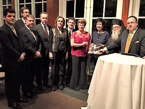 group of people honoring first lady of cyprus